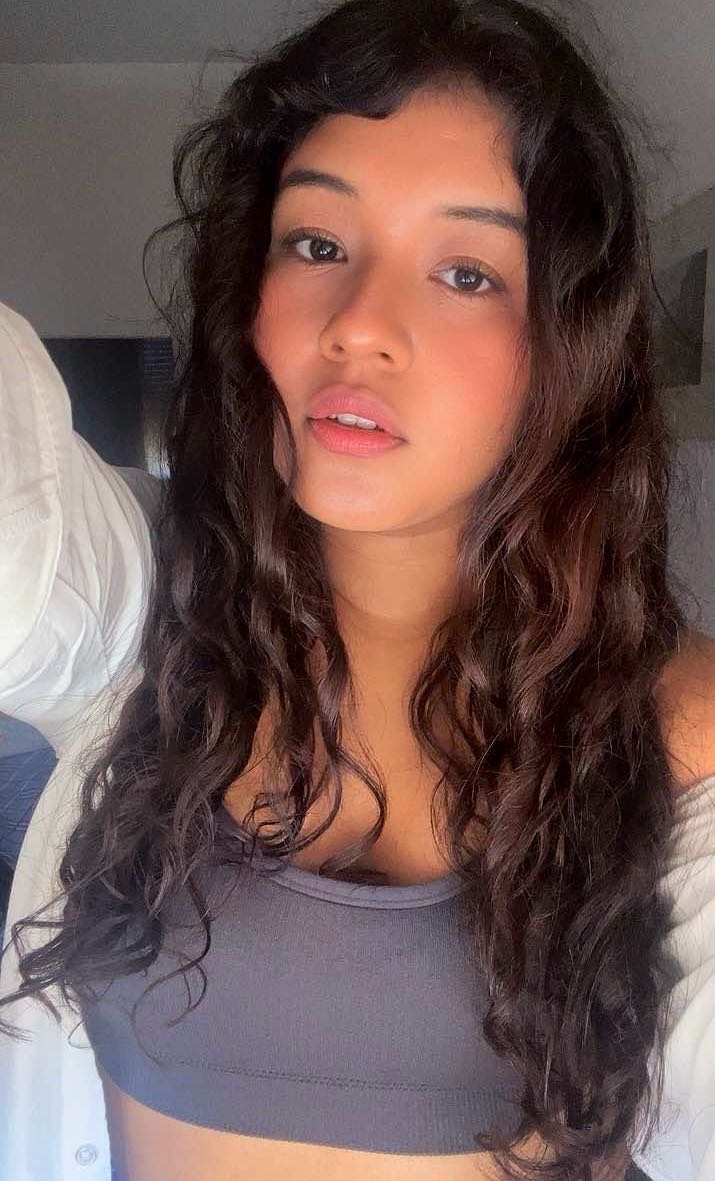 Tays, a host from Italy, on camera for a live video chat
